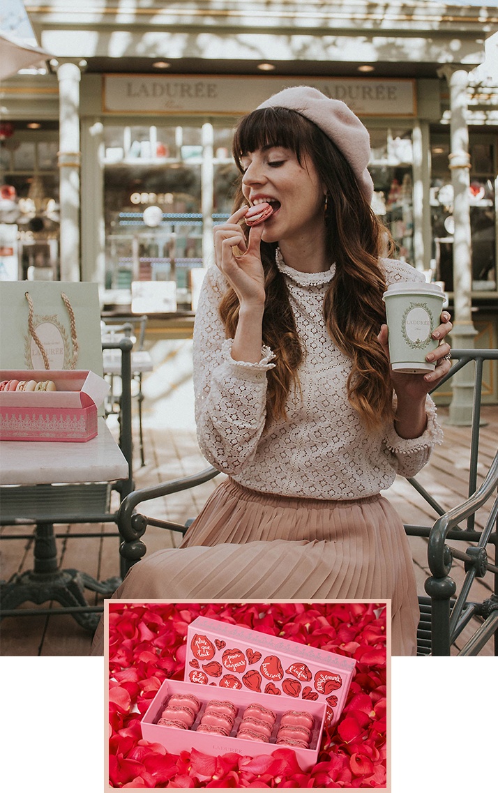 Girl eating a pink macaron
