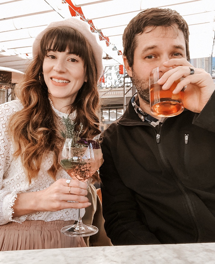 a couple drinking cocktails