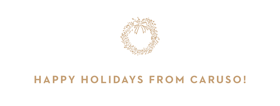 An icon of a wreath and "Happy Holidays from Caruso" text 
